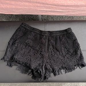 Black fringe shorts